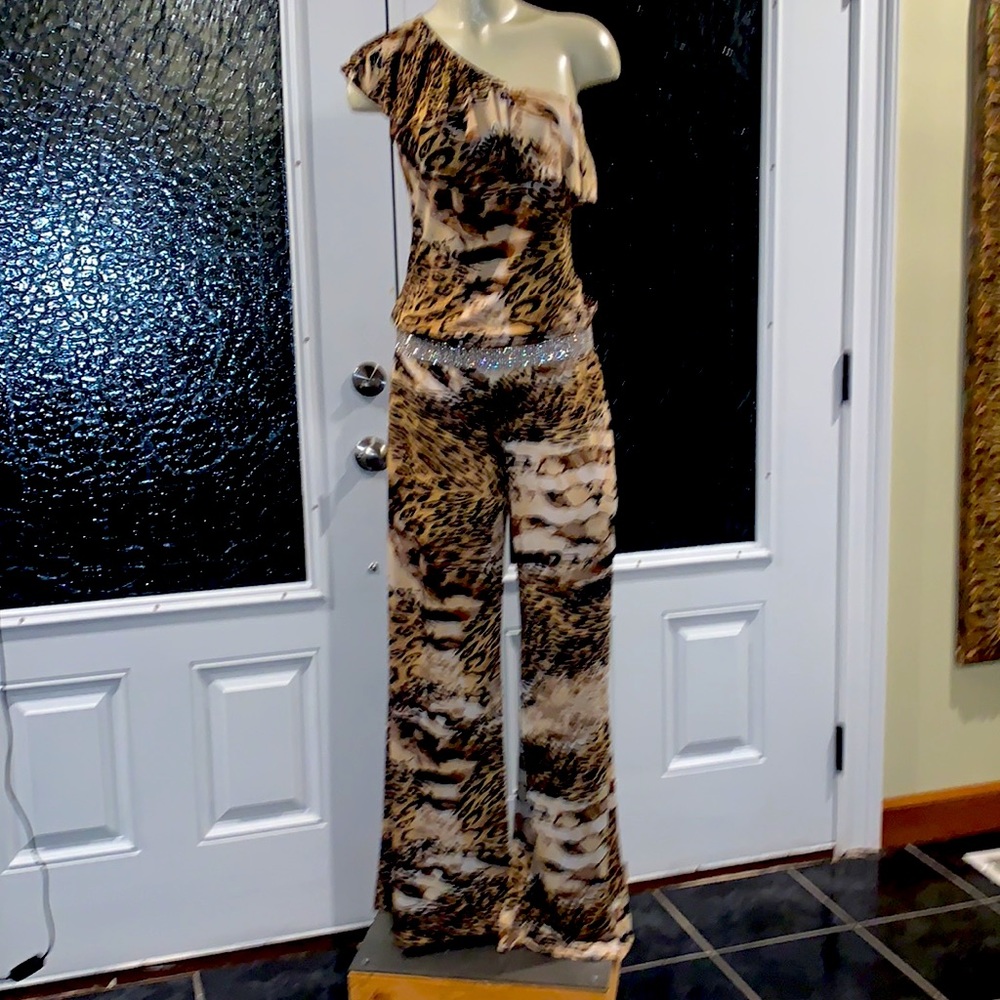 Beautiful Animal print one shoulder jump suit, wide legs, very sexy.